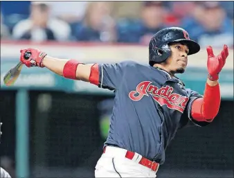  ?? [TONY DEJAK/THE ASSOCIATED PRESS] ?? The Indians’ Francisco Lindor watches his solo home run in the eighth inning, which made it 8-6 and provided an important insurance run.