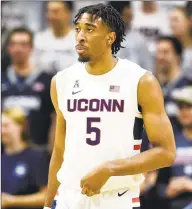  ?? Stephen Dunn / Associated Press ?? Isaiah Whaley and the UConn men’s basketball team will take on St. Joseph’s on Wednesday.