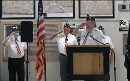  ?? FACEBOOK VIDEO SCREENSHOT ?? WAVEM President Don Smith gives a solute during the Veterans Day ceremony