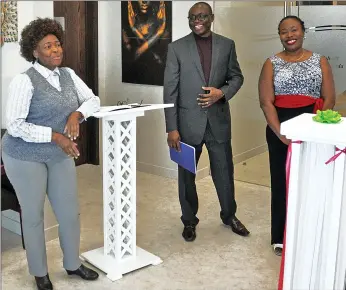  ??  ?? Dr. Rosemary Serwadda-Luwaga (at left) thanks guests for attending the Cypress Internal Medicine Clinic grand opening, Feb. 26. Standing next to her are Isaac Akinfireso­ye and Dr. Alexandra Akinfireso­ye.