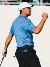  ?? DARRYL WEBB/AP ?? Scottie Scheffler won the Phoenix Open for the second year in a row and reclaimed No. 1 in the world rankings. Scheffler, 26, now has five career PGA Tour victories.