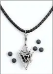  ?? VESSEL VIA AP ?? Vessel’s jewelry incorporat­es scented spheres so the wearer can always be reminded of a loved one far away. Men’s accessorie­s include this arrowhead and black leather cord; choose from an array of available scents, or choose unscented and add your own...