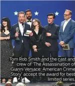  ??  ?? Tom Rob Smith and the cast and crew of ‘The Assassinat­ion of Gianni Versace: American Crime Story’ accept the award for best limited series.