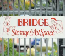  ??  ?? A sign welcomes visitors to the Bridge Storage and Art Space in Richmond. The city has told the facility owners that those who use the site can no longer use it for work.