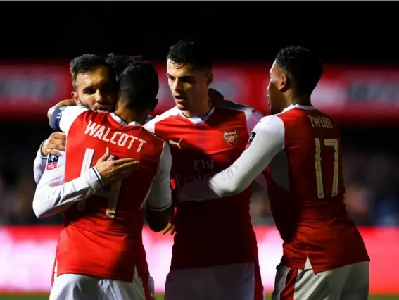  ?? (Getty) ?? Theo Walcott scored Arsenal's second goal of the evening to put the tie to bed