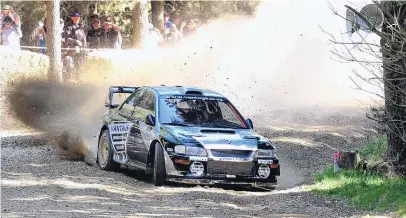  ?? PHOTO: SUPPLIED ?? Alistair McRae lets it all hang out during the Ashley Forest Rallysprin­t in North Canterbury.