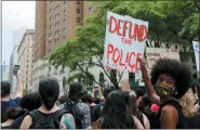  ?? THE ASSOCIATED PRESS ?? Protesters march June 6, in New York. Demonstrat­ions continue across the United States in protest of racism and police brutality, sparked by the May 25death of George Floyd in police custody in Minneapoli­s.