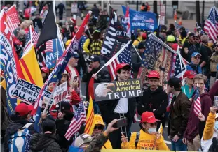  ?? Getty Images/tns ?? Supporters of President Donald Trump rally at Freedom Plaza in Washington, D.C., on Dec. 12, 2020, to protest the 2020 election results.