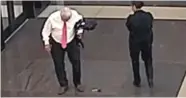  ?? COOK COUNTY SHERIFF'S OFFICE ?? An image taken from surveillan­ce video shows Cook County Judge Joseph Claps dropping a gun on the floor in July at the Leighton Criminal Court Building.