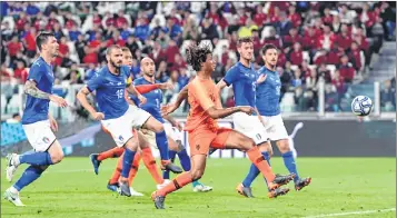  ??  ?? Dutch defender Nathan Ake (3R) vies with Italian players during their friendly at the Allianz stadium in Torino.
