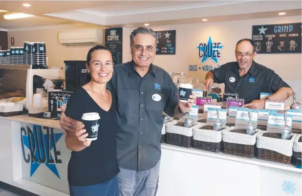  ?? Picture: ANNA ROGERS ?? FULL OF BEANS: Cruze Coffee team manager Sharee Watts, owner Gilberto Risa and master roaster Harry Rains are celebratin­g 10 years in business.