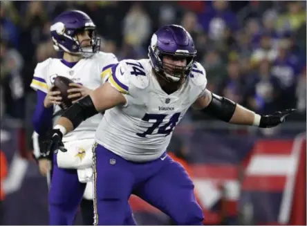  ?? WINSLOW TOWNSON — THE ASSOCIATED PRESS ?? FILE - In this Dec. 2, 2018, file photo, Minnesota Vikings offensive tackle Mike Remmers blocks during an NFL football game against the New England Patriots at Gillette Stadium in Foxborough, Mass.