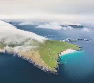  ?? Photos Tourism Ireland ?? The Great Blasket Island off the coast of Kerry in Ireland is spread across 445 hectares of unspoilt mountain terrain