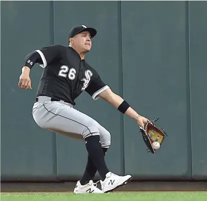  ?? AP ?? Sox right fielder Avisail Garcia is unable to hold on to a foul ball hit by the Orioles’ Cedric Mullins in the first inning Saturday.