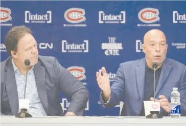  ?? THE CANADIAN PRESS/CHRISTINNE MUSCHI ?? Montreal Canadiens general manager Kent Hughes, right and executive vice president Jeff Gorton speak to the media during their end of season news conference in Brossard, Que., on Wednesday April 17, 2024.