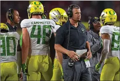 ?? KYUSUNG GONG — THE ASSOCIATED PRESS ?? Oregon coach Mario Cristobal has gotten the Ducks back into the national conversati­on after a three-year span during which they went 20-18.