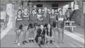  ?? Calhoun Cross Country ?? Members of the victorious Calhoun girls cross country hold their trophy after winning the county-wide Cowbell Classic Tuesday at the Resaca Battlefiel­d.