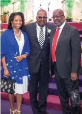  ?? BISHOP J.W. MACKLIN ?? Bishop J.W. Macklin, center, with Bernard J. Tyson and Denise BradleyTys­on.