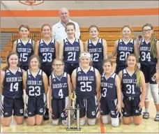  ?? Scott Herpst ?? The Gordon Lee Lady Trojans, coached by Lester Gaylon and Kassidy Blevins (not pictured) won the 2020 NGAC Girls’ JV tounament title with a 26-14 win over Ringgold Friday afternoon at Lafayette Middle School.