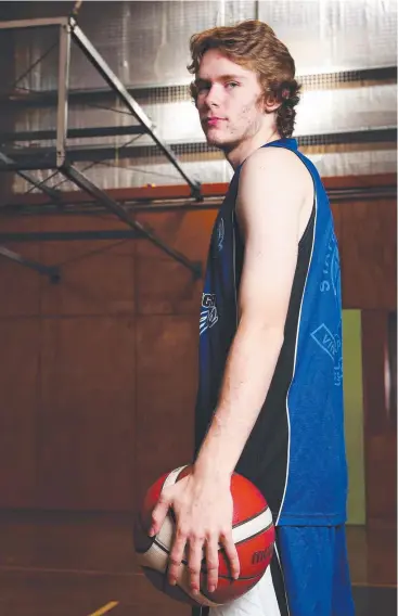  ?? Picture: BRENDAN RADKE ?? Ky Stattmann is one of Cairns State High School’s leading players at the Champions Basketball Schools of Queensland competitio­n in Brisbane.