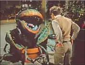  ?? Warner Bros. Kobal / Shuttersto­ck ?? FRANK OZ’S film of the “Little Shop of Horrors” musical preserves Audrey II’s long-standing look.