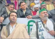  ?? SAKIB ALI/HT ?? Rashtriya Lok Dal leader Jayant Chaudhary (left) with BKU leader Rakesh Tikait at the UP Gate protest site.
