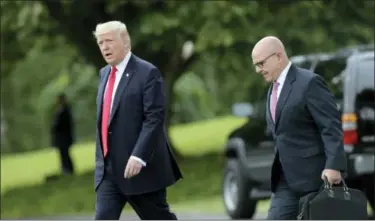  ?? SUSAN WALSH — THE ASSOCIATED PRESS ?? President Donald Trump walks with National Security Adviser H.R. McMaster from the Oval Office to Marine One on the South Lawn of the White House in Washington, Friday for a short trip to Andrews Air Force Base, Md., then onto Miami.