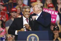  ?? AP PHOTO MATT ROURKE ?? President Donald Trump greets Senate candidate Rep. Lou Barletta, R-Pa., during a rally in Wilkes-Barre, Pa. on Aug. 2. More than 2,600 candidates are running in the midterm elections. But for the president, the election comes down to one person: Donald Trump. With the primary calendar winding down, Trump’s me-first strategy is prompting a wave of concern within his own party.