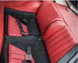  ??  ?? Above, left and right: Red interior trim is perfect with the Slate Grey exterior. Upholstery work was carried out by Dean’s friends at Bespoke Auto Interiors