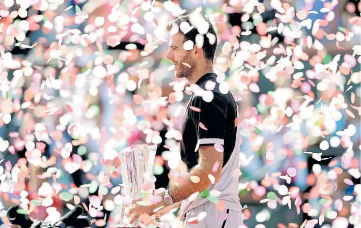  ?? AFP ?? Tiren, tiren papelitos. Una lluvia de colores baña a Juan Martín Del Potro en Indian Wells. “No puedo creer que gané esta final. Este título me puede marcar el resto del año”, afirmó.