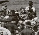  ?? Carlos Avila Gonzalez / San Francisco Chronicle ?? The Astros and A’s brawl on Aug. 9 after Oakland’s Ramon Laureano was hit by a Humberto Castellano­s pitch.