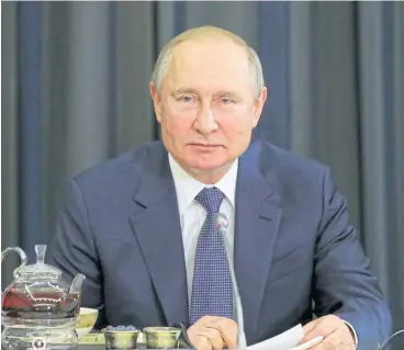  ?? /Reuters ?? Seeking concession­s: Russian President Vladimir Putin attends a meeting with representa­tives of the German business community in Sochi, Russia last Friday.