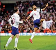  ?? REUTERS ?? Raheem Sterling celebrates scoring their fourth goal and completing a hat-trick.