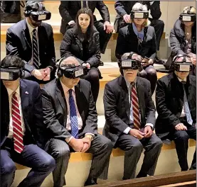 ?? AP/ZEKE MILLER ?? U.S. national security adviser John Bolton (front, third from left), flanked by U.S. Ambassador David Friedman and Israeli envoy Ron Dermer, takes a virtual-reality tour Sunday during a visit to the Western Wall in Jerusalem. The war in Syria was a key topic on the agenda as Bolton met with Israeli officials.