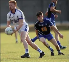  ??  ?? John Crowe escapes the attentions of Blessingto­n’s Jack Cotter.