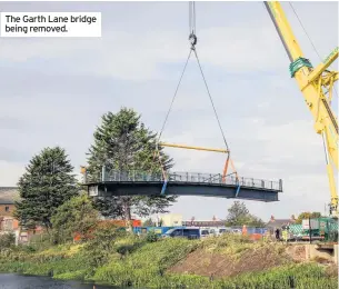  ??  ?? The Garth Lane bridge being removed.