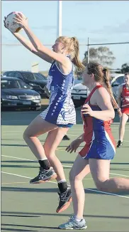  ??  ?? STRONG: Harrow-balmoral defender Ella Rees leaps to take a pass in front of Kalkee goalie Tamara Exell. Rees and fellow defender Ebonie Salter face a good battle with Natimuk United shooters on Saturday. Picture: LYNTON BROWN PHOTOGRAPH­Y