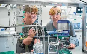  ?? MARGARET LOW ?? GNS Science lead researcher Dr Kate Clark, left, with radiocarbo­n scientist Dr Jocelyn Turnbull at GNS Science’s Rafter Radio Carbon Lab.