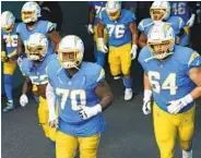 ?? LYNNE SLADKY AP ?? The Chargers would save $11.5 million against the salary cap by cutting offensive guard Trai Turner (70).