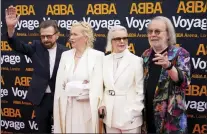  ?? THE ASSOCIATED PRESS ?? Members of ABBA, from left, Bjorn Ulvaeus, Agnetha Faltskog, Anni-Frid Lyngstad and Benny Andersson arrive for the ABBA Voyage concert in London on Thursday.