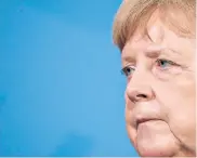  ??  ?? No jab: Angela Merkel, right, said this week she would not take the Oxfordastr­azeneca vaccine, fuelling suspicions among many Germans about it