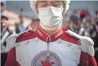  ?? ?? Austin Bowman pauses briefly before leading the band to St. John Arena for the Skull Session.