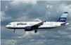  ?? — Reuters ?? A Jetblue aircraft comes in to land at Long Beach Airport in Long Beach, California.