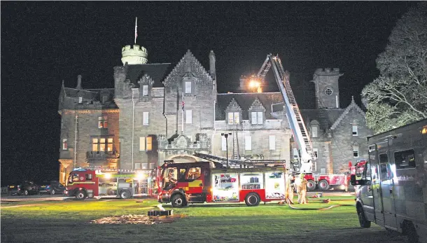  ??  ?? RESPONSE: Emergency services attend a fire emergency at Skibo Castle, where it is believed a fire broke out in a chimney and spread along the roof space