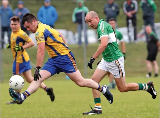  ??  ?? Aghabullog­ue’s Patrick Finnegan and Liam Walsh, Grenagh, in action in the County Intermedia­te Football Championsh­ip at Cloughduv. Photo by Jim Coughlan