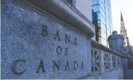  ?? SEAN KILPATRICK / THE CANADIAN PRESS FILES ?? The Bank of Canada has signalled it would reduce bond purchases it has been making to bolster the economy.