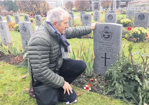  ?? ?? Kilworth man Pat O’Connor visits the grave of Flight Sgt. Jim Howard, RAF, in the National War Graves Commission Cemetery, Prague in November 2019.