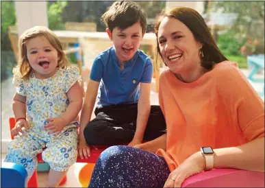  ??  ?? RELIEF: Kate Mansey with her baby daughter Ivy and five-year-old son Ted, both of whom have now recovered