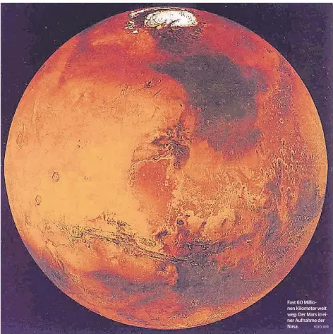  ?? FOTO: RTR ?? Fast 60 Millionen Kilometer weit weg: Der Mars in einer Aufnahme der Nasa.