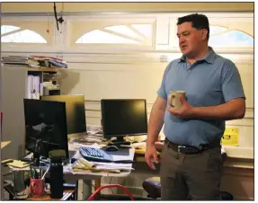  ?? (AP/Sara Cline) ?? Elliot Dale stands in his garage that he turned into a home office in Lake Oswego, Ore. Today, if the home-office tax deduction still existed, 74 million Americans potentiall­y could have qualified for it.